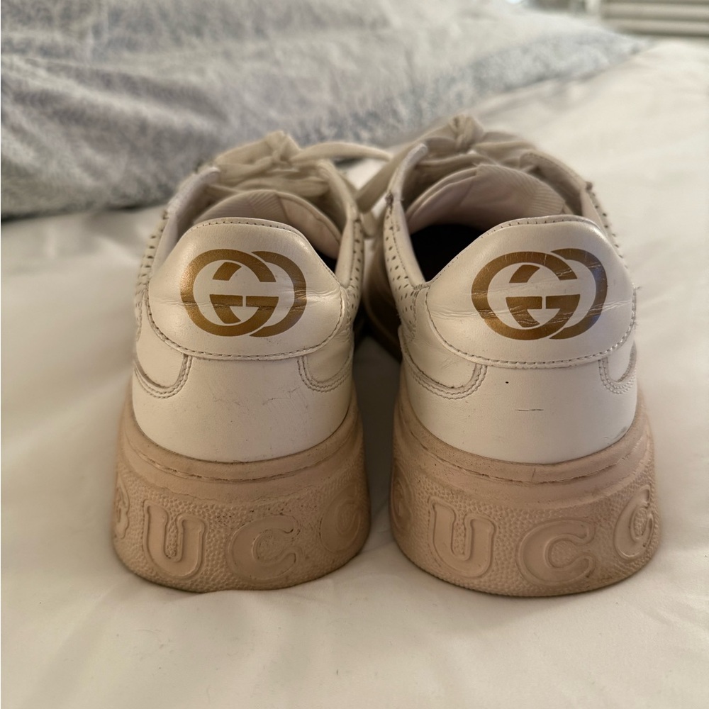 Gucci Cream Sneakers with Gold Emblem